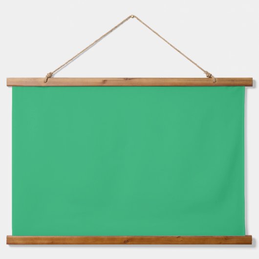 Een levendig groen blad met prominente aderen en e hangend wandkleed (Voorkant 3)