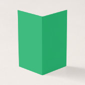 Een levendig groen blad met prominente aderen en e kaart (Buitenkant)