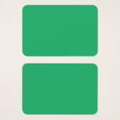 Een levendig groen blad met prominente aderen en e visitekaartje (Voorkant /achterkant)