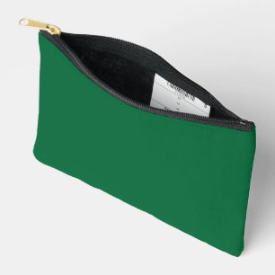 Een levendig groen blad met verschillende aderen i etui