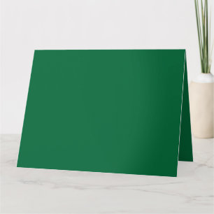 Een levendig groen blad met verschillende aderen i kaart