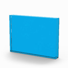 Een levendige effen blauwe achtergrond vult het ka fotoblokken