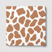 Een lieflijk zittende giraffe Keepsake baby boek (Achterkant)