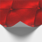 Een lippendruk links door lippenstift op wit papie cadeaupapier (Hoek)