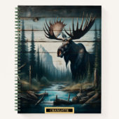 Een majestueuze eland die bij een rustige rivieroe notitieboek (Voorkant)