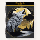 Een majestueuze wolf huilt bij het gloeiende maanl notitieboek (Voorkant)