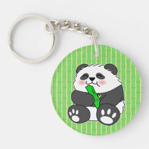 Een malle baby panda die een bamboestengel eet sleutelhanger