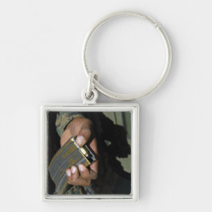 Een marinier laadt blanco munitieronden sleutelhanger