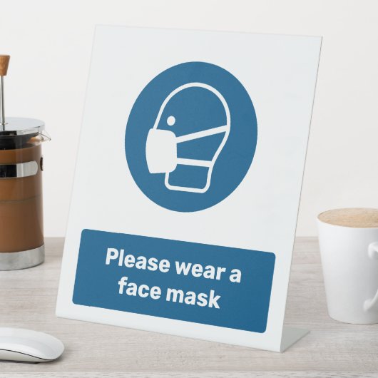 Een masker draag reclamebord met voetstuk (Insitu)