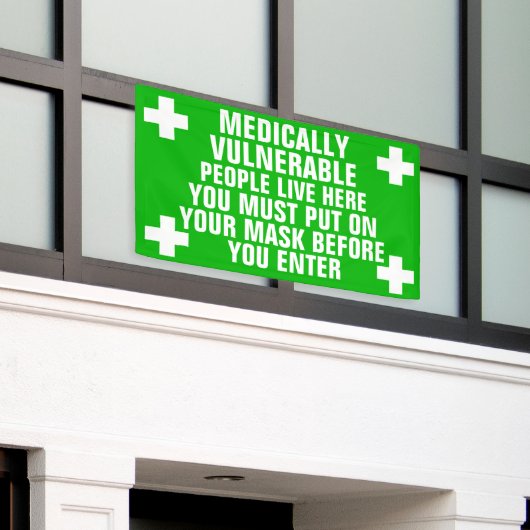 Een medisch kwetsbaar Draag een masker Spandoek (Buitenkant Gebouw)