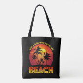 Een meisje dat van het strand houdt tote bag (Achterkant)