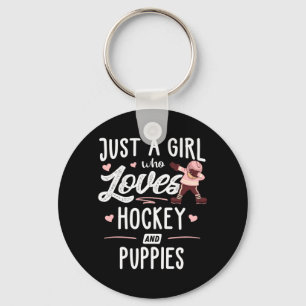 Een Meisje Dat Van Hockey En Puppies Houdt Cadeau Sleutelhanger
