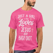 Een meisje dat van Jezus en Bigfoot houdt T-shirt (Voorkant)