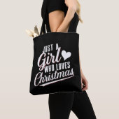 Een meisje dat van kerst houdt tote bag (Dichtbij)