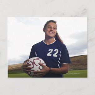 een meisje voetballer met voetbal briefkaart