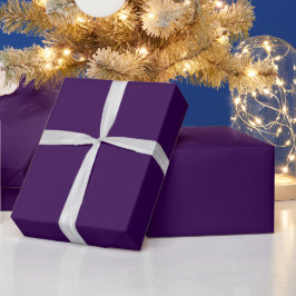 Een minimalistische paarse achtergrond met subtiel cadeaupapier