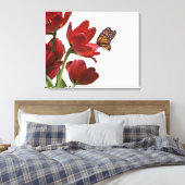 een monarch bezoekt een bouquet rode tulpen canvas afdruk (Insitu (Slaapkamer))