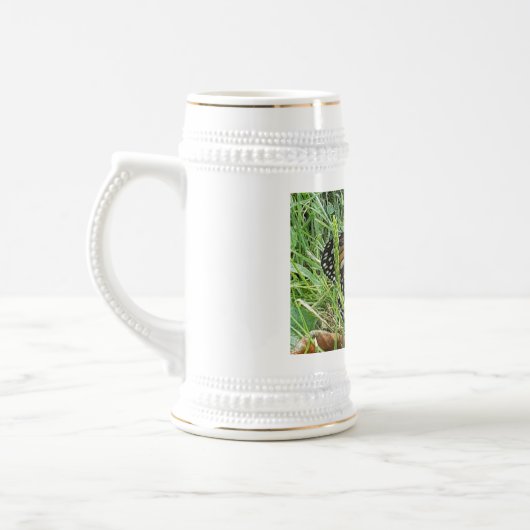 Een Monboogvlinder Bierpul (Links)