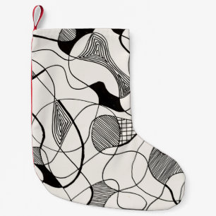 Een monochrome abstracte pen en inktschets; onrege kleine kerstsok