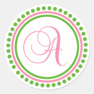 Een monogram (lichtroze / groene puntcirkel) ronde sticker