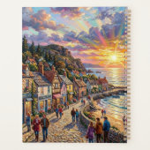 Een mooi strand dorpsbordes bij zonsondergang planner (Achterkant)