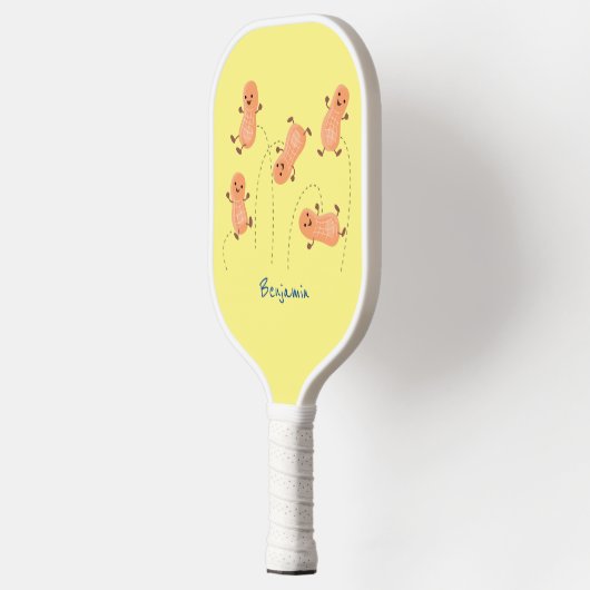 Een mooie cartoon van een pinda's pickleball paddle (Links)