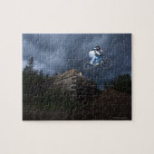 Een mountainbiker springt van een blokhut in Idaho Legpuzzel (Horizontaal)