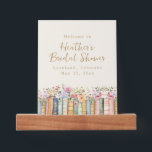 Een nieuw Chapter Books Vrijgezellenfeest Fotoplankje<br><div class="desc">Een nieuw hoofdstuk begint. Gasten begroeten met een elegant Wildflower en Boeken welkom poster, ontworpen om naadloos te passen op een afbeeldingen richel voor een stijlvolle en verfijnde weergave. Met delicate waterverf kunstwerken van gestapelde boeken en bloeiende wilde bloemen in zacht roze, blauw, groen en goud, zet dit ontwerp de...</div>