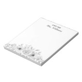 Een notitie van de flessenbloem van de flacon met  notitieblok (Linkerzijde)