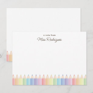 Een notitie van pastelkleurige regenboogpotloden L Notitiekaartje