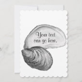 Een oesterschelp met het gezegde "de wereld is jou kaart (Achterkant)