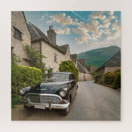 Een oldtimer geparkeerd in een schilderachtig dorp legpuzzel