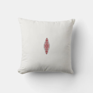 Een ontwerp van een rood en wit patroon kussen