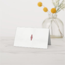 Een ontwerp van een rood en wit patroon plaatskaartje
