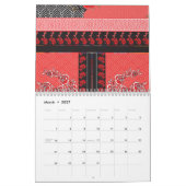 Een ontwerp van een rood en zwart behang kalender (Mar 2027)