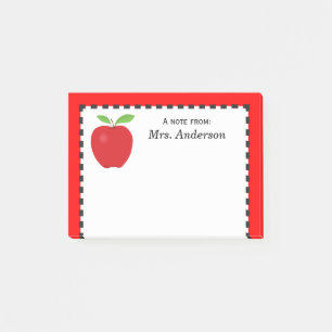 Een opmerking van leraar met rode appel post-it® notes