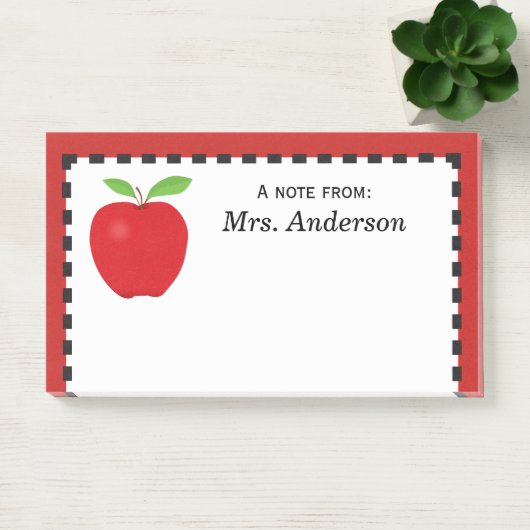 Een opmerking van leraar met rode appel post-it® notes (Kantoor)