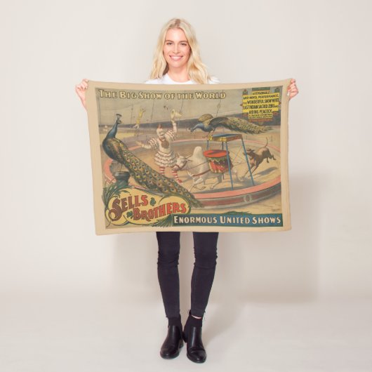 Een optredende zebu en pauw met clown trainer fleece deken (In situ)