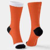 Een oranje achtergrond met een sokken (Gebogen)