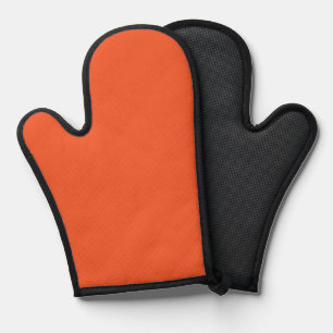 Een oranje achtergrond met een zwarte rand ovenwant