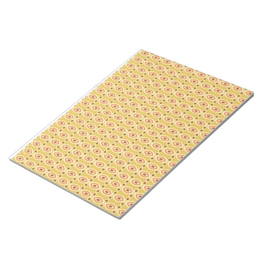 Een oranje en gele achtergrond met cirkels notitieblok (Schuin)
