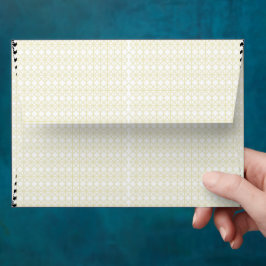 Een oranje en gele achtergrond met kleine stippen envelop