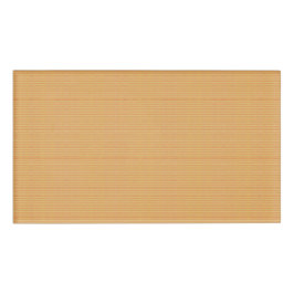 Een oranje en gele achtergrond met kleine stippen naambadge