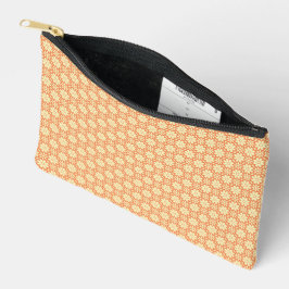Een oranje en witte achtergrond met een motief etui