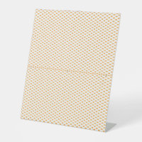 Een oranje en witte achtergrond met kleine cirkels