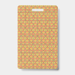 Een oranje, geel en bruin symmetrisch patroon w badge
