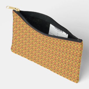 Een oranje, geel en bruin symmetrisch patroon w etui