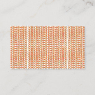 Een oranje vloerkleed met een textuurpatroon ligt visitekaartje