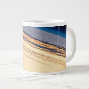 Een orbitale zonsondergang voor de kust van Baja C Grote Koffiekop