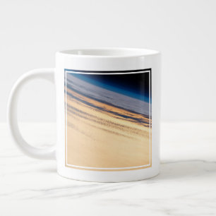 Een orbitale zonsondergang voor de kust van Baja C Grote Koffiekop